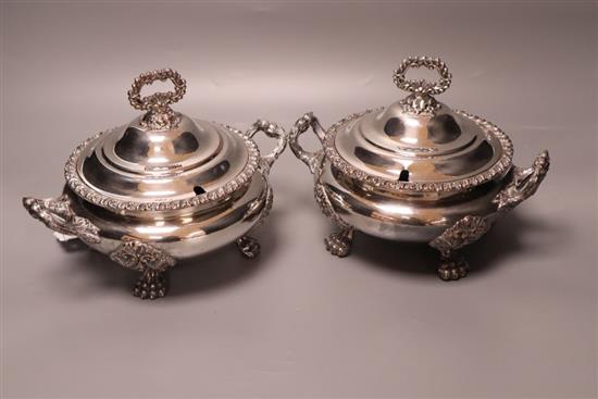 A pair of early 19th century Old Sheffield plate circular two-handled tureens and covers,